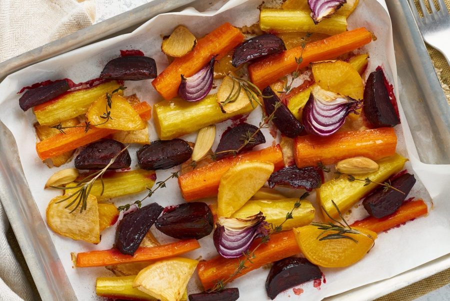 Colorful Roasted Vegetables On Tray With Parchment. Mix Of Carrots, Beets, Turnips, Rutabaga, Onions. Vegetarianism, Veganism, Proper Nutrition, Lchf. Top View
